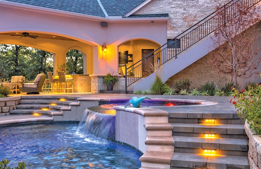 swimming pool with iluminated decl stairs