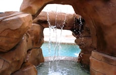 waterfall-coming-down-inside-pool-grotto