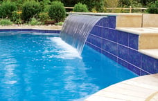  wide-cascade-waterfall-on-pool