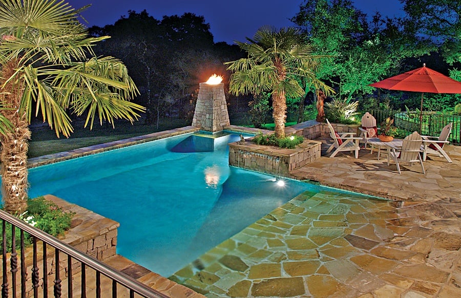 Flagstone beach entry pool at night