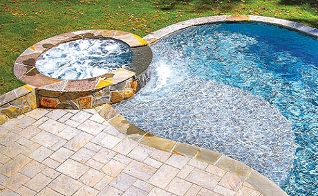 Freeform pool with bubbling spa