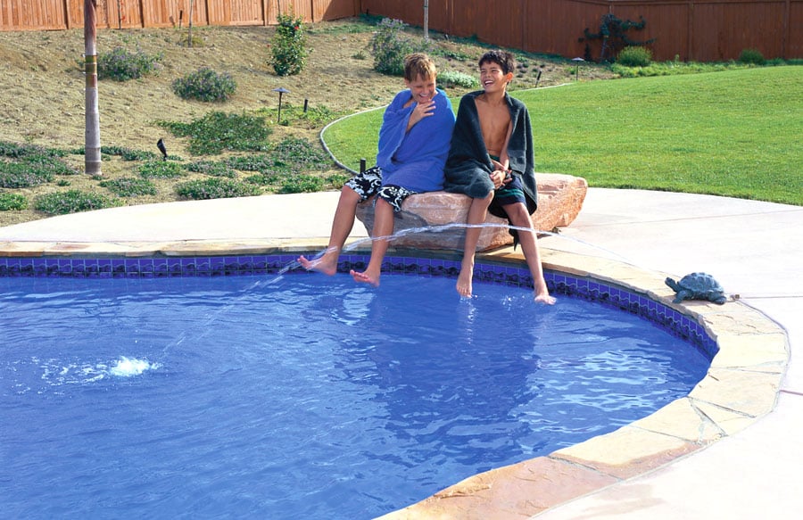 boys-at-pool-with-turtle-statue