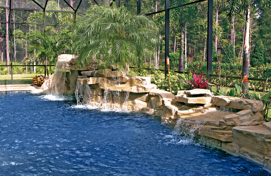 tropical-dark-bottom-pool-with-faux-rock-waterfall