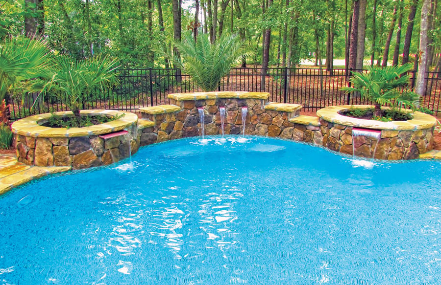 decorative-planter-box-water-feature-on-pool