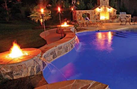 Twin firepits with pool wall seating