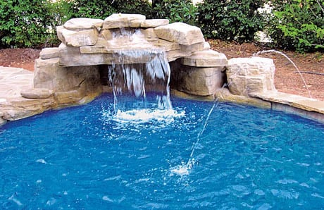 Ten affordable swimming pool grotto designs—in pictures—for your backyard