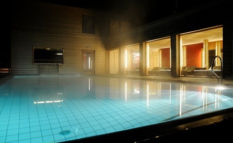 pool at night with mist evaporation